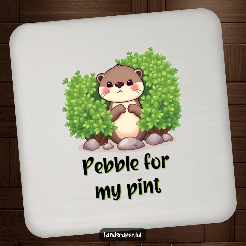 Funny drink coaster featuring a curious otter peeking from behind a bush, dropping a shiny pebble. A humorous and protective accessory.