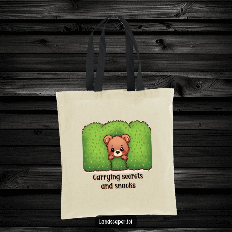 Funny bear cub tote bag, peeking adorably from behind a neatly trimmed hedge, a humorous and practical accessory.