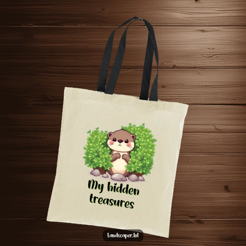 Funny tote bag showing a curious otter peeking from behind a lush green bush, dropping a shiny pebble. A practical and humorous accessory.